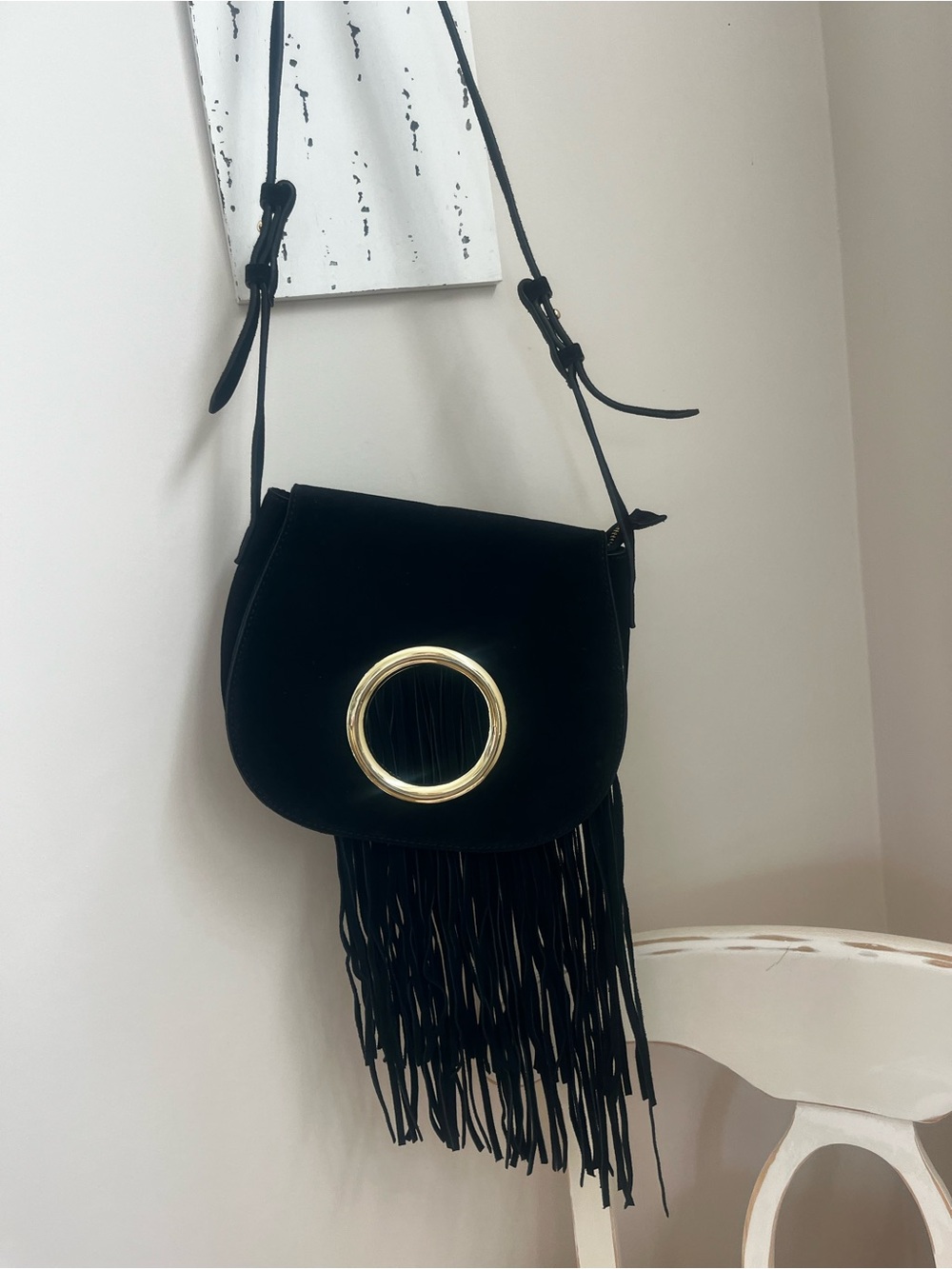 Black Fringe Crossbody Bag with Gold Ring Accent by INZI